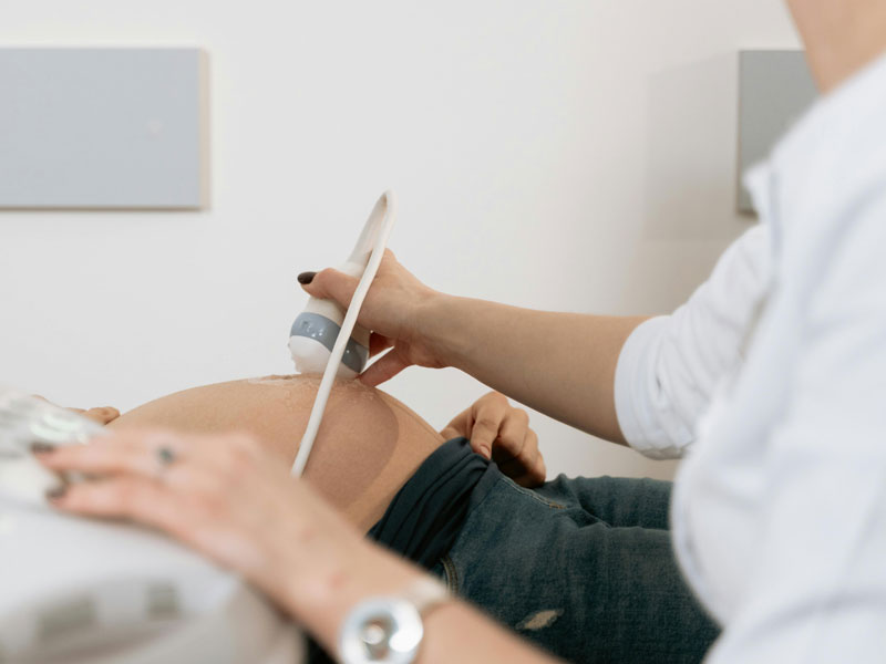 Pregnant person receiving an ultrasound scan – obstetric and pregnancy care with Dr Leila Usher, Newcastle Obstetrician and Gynaecologist.